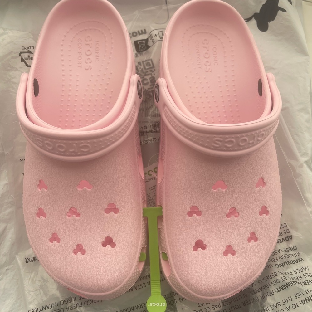 Disney pink crocs women’s size 9